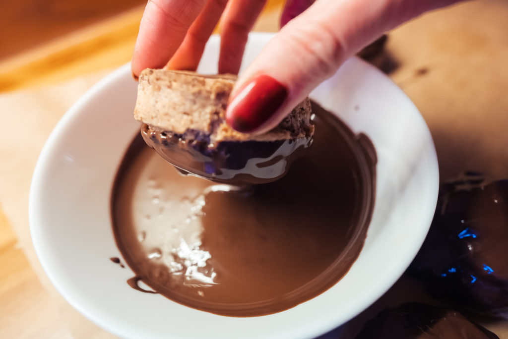 dipping sarah bernhardt cookies in chocolate