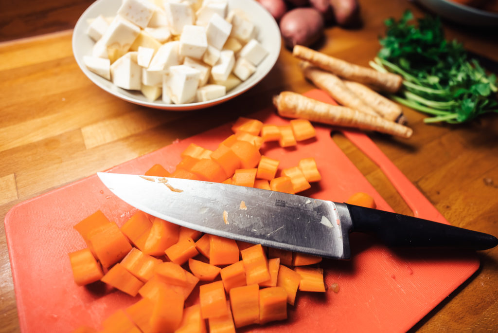 cutting vegetables for norwegian lapskaus stew