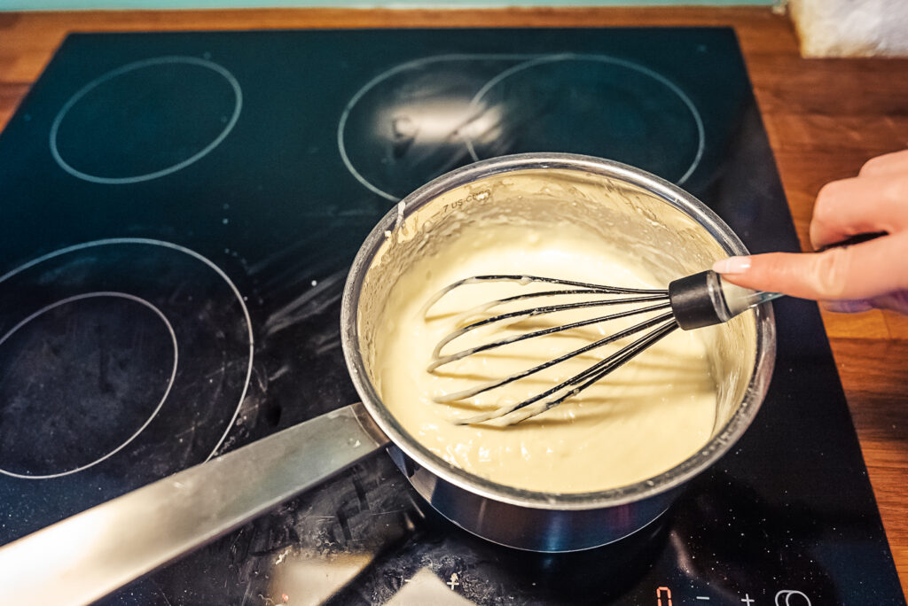 mixing rømmegrøt sour cream porridge