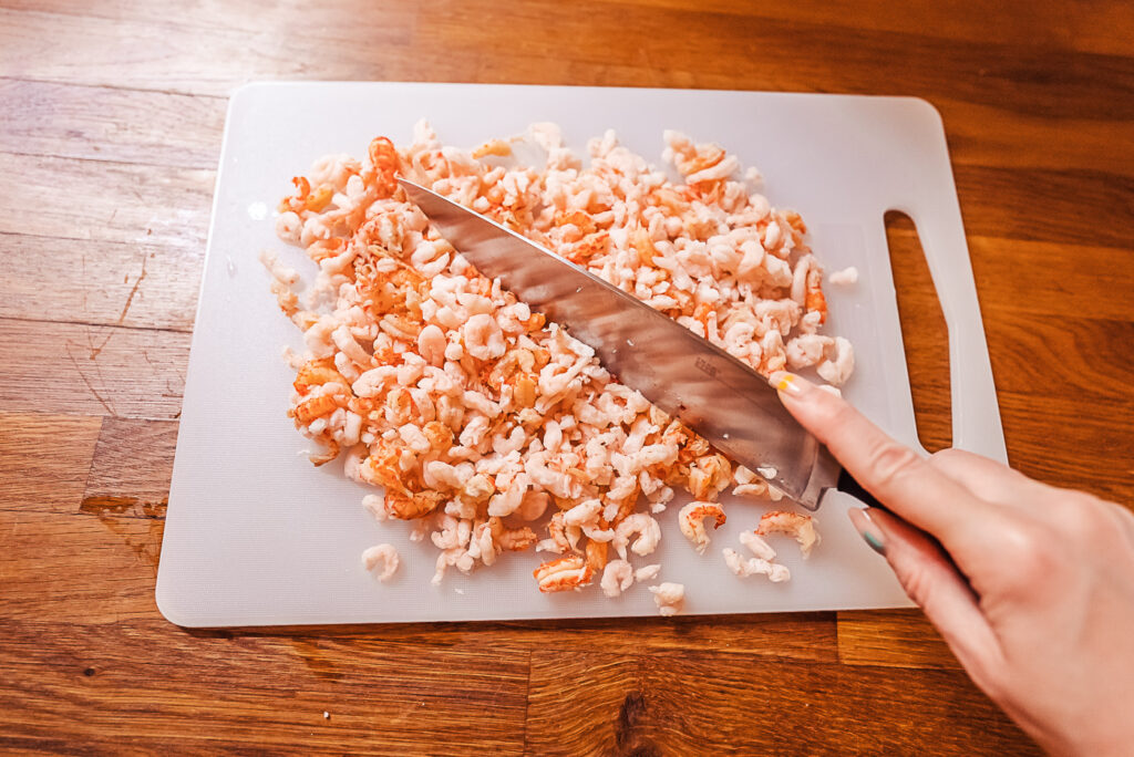 chopping shrinp for skagenröra Swedish shrimp salad