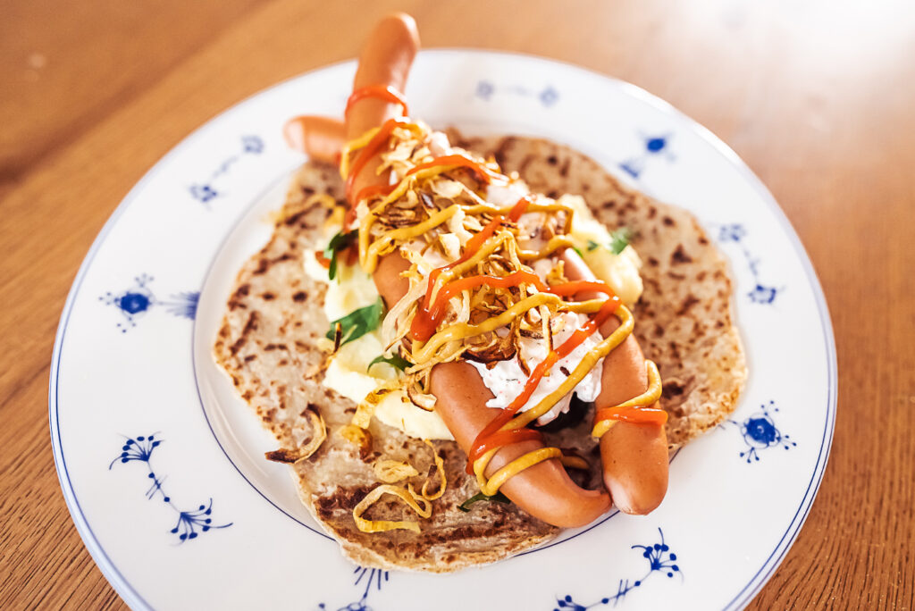 swedish hotdogs in lomper with Skagenröra
