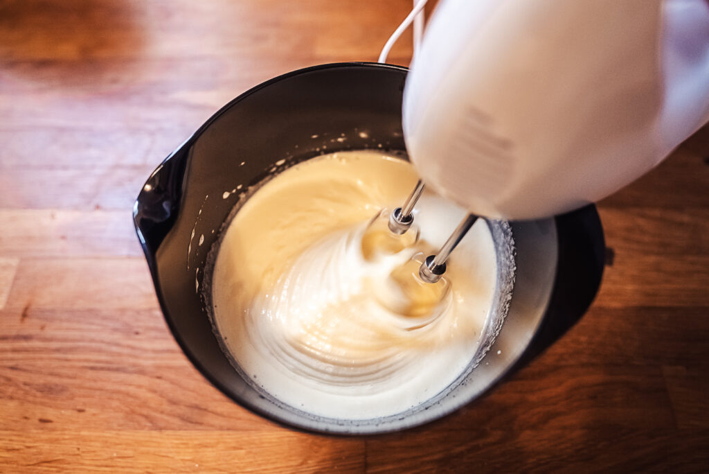 whisking eggs and sugar