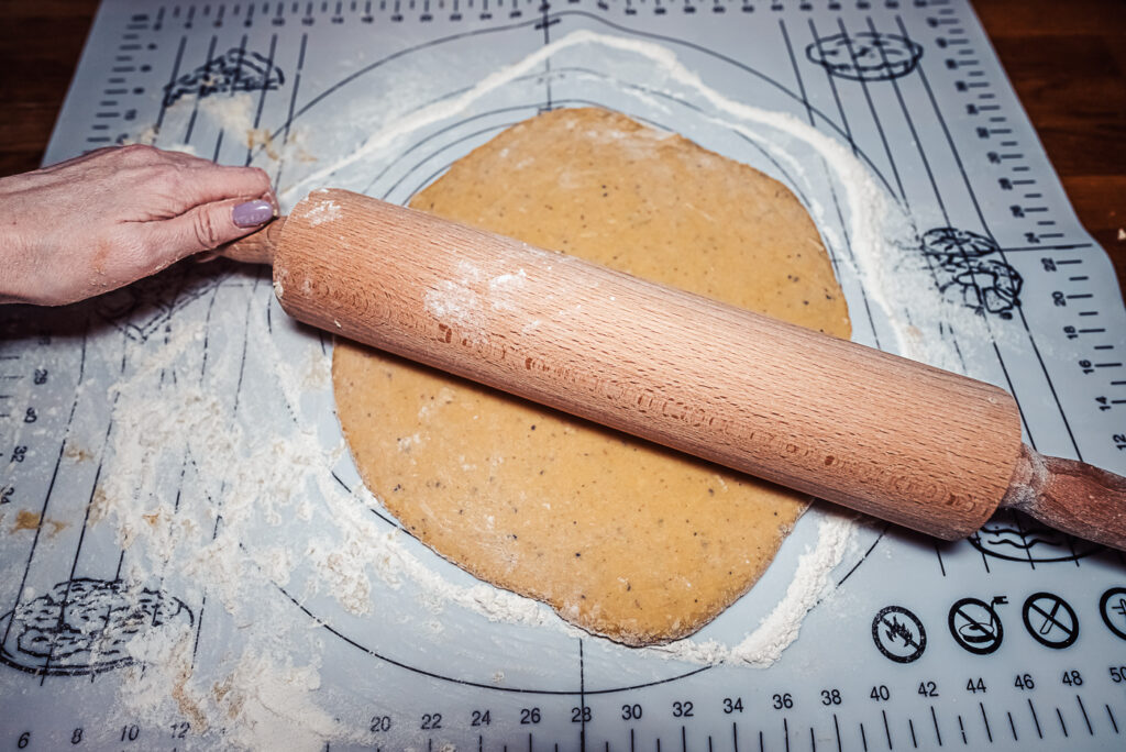 rolling out fattigmann dough