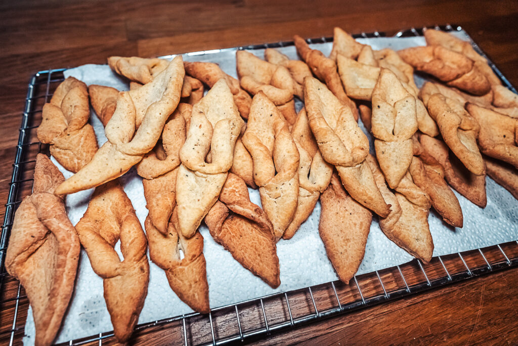 cooling fattigmann cookies on wire rack