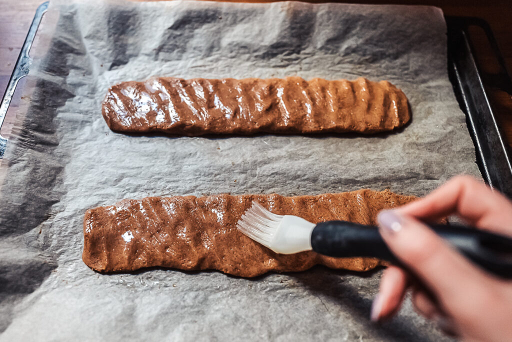 brushing brune pinner dough with egg white