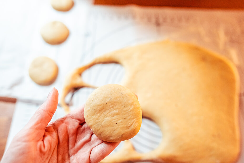 cutting dough rounds for berliner doughnuts
