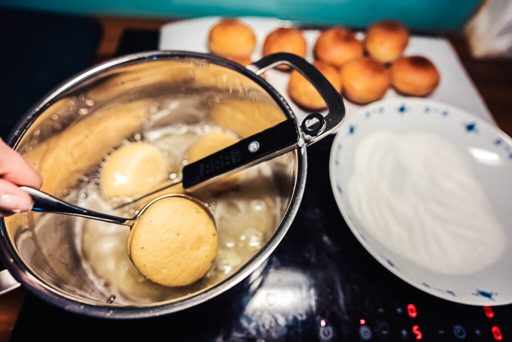 dropping berliner dough in oil