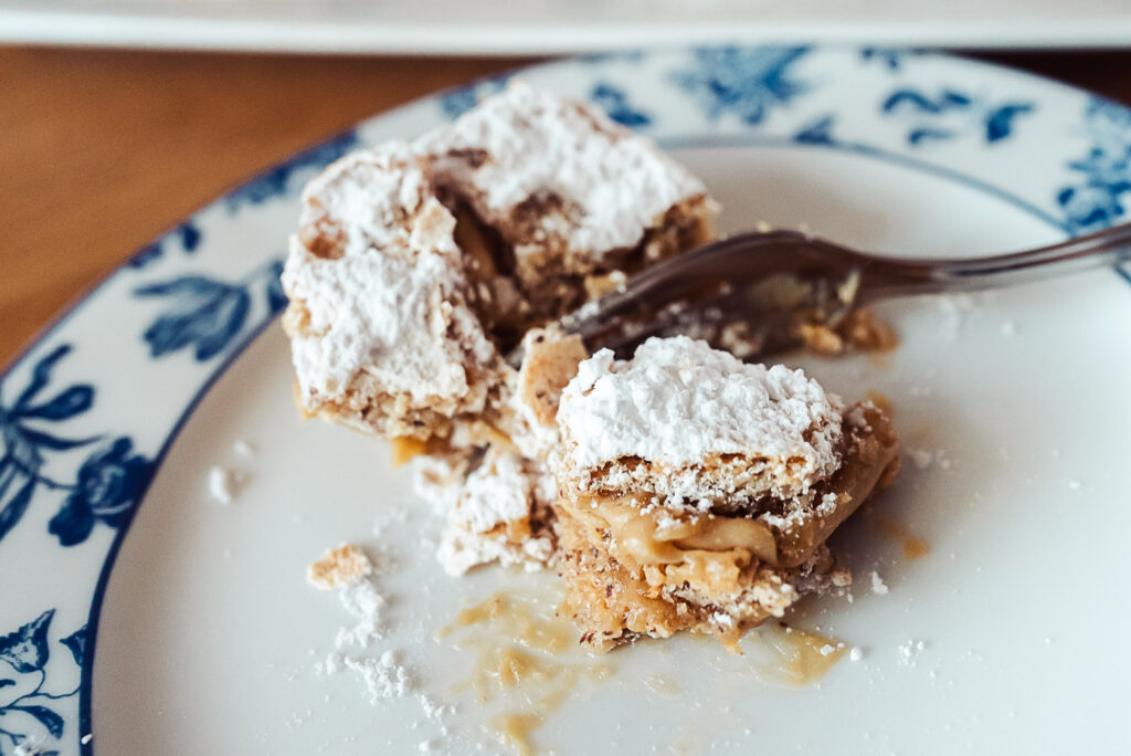 eating a piece of Danish fragilité cake