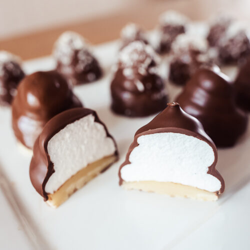 Danish flødeboller, marshmallow puffs with marzipan base