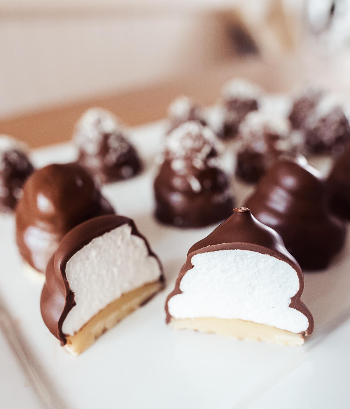 Danish flødeboller, marshmallow puffs with marzipan base