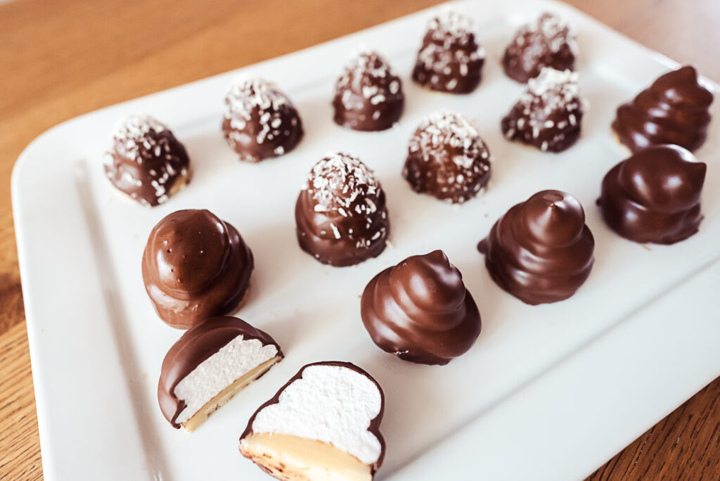 Danish flødeboller, marshmallow puffs with marzipan base