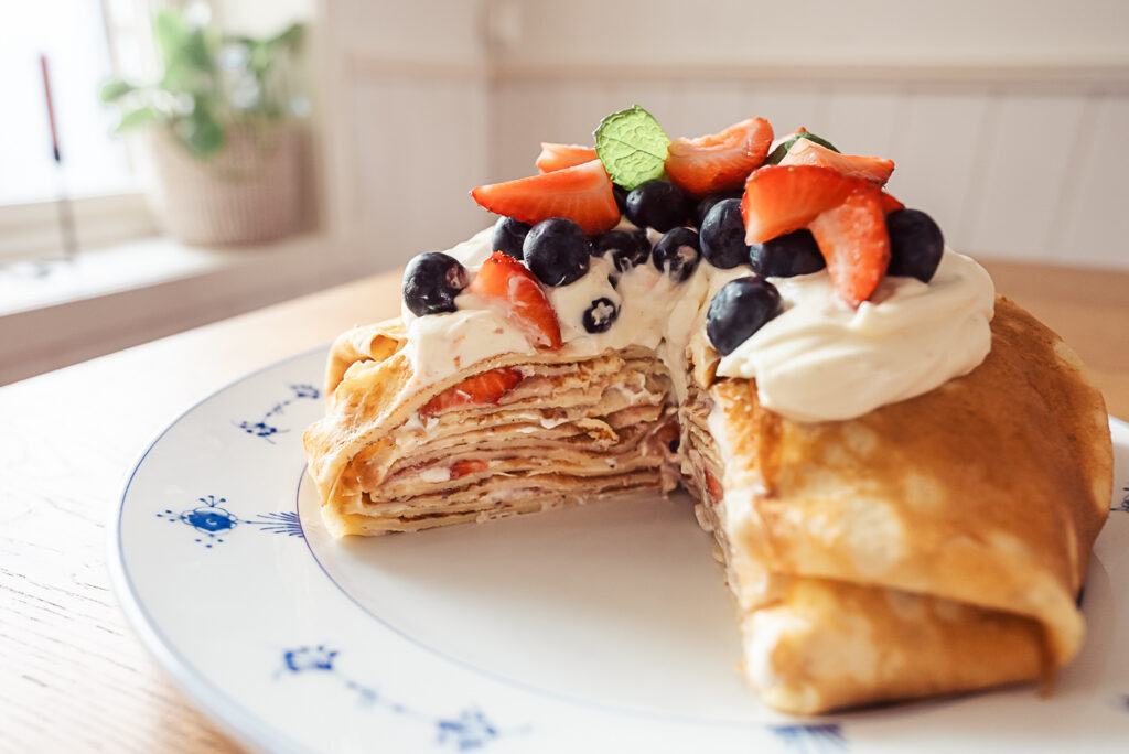Pannkakstårta, Swedish pancake cake topped with cream and berries