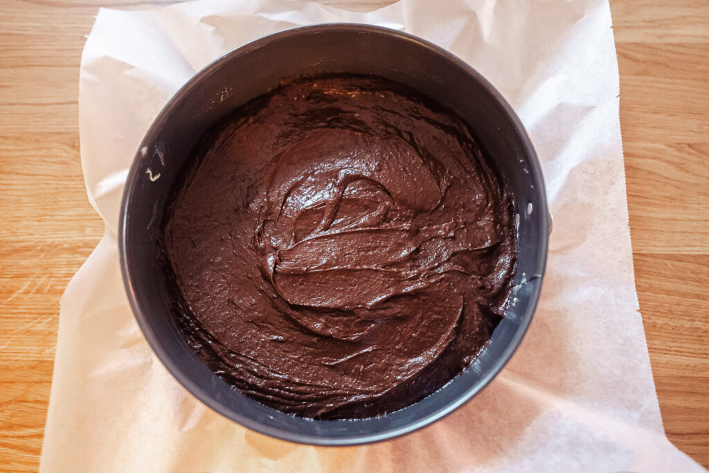 kladdkaka batter in a round springform