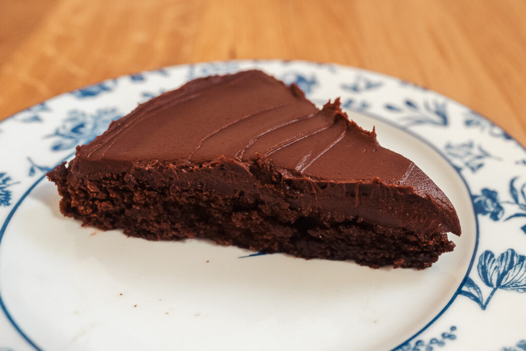 slice of kladdkaka chocolate cake with dark chocolate ganache