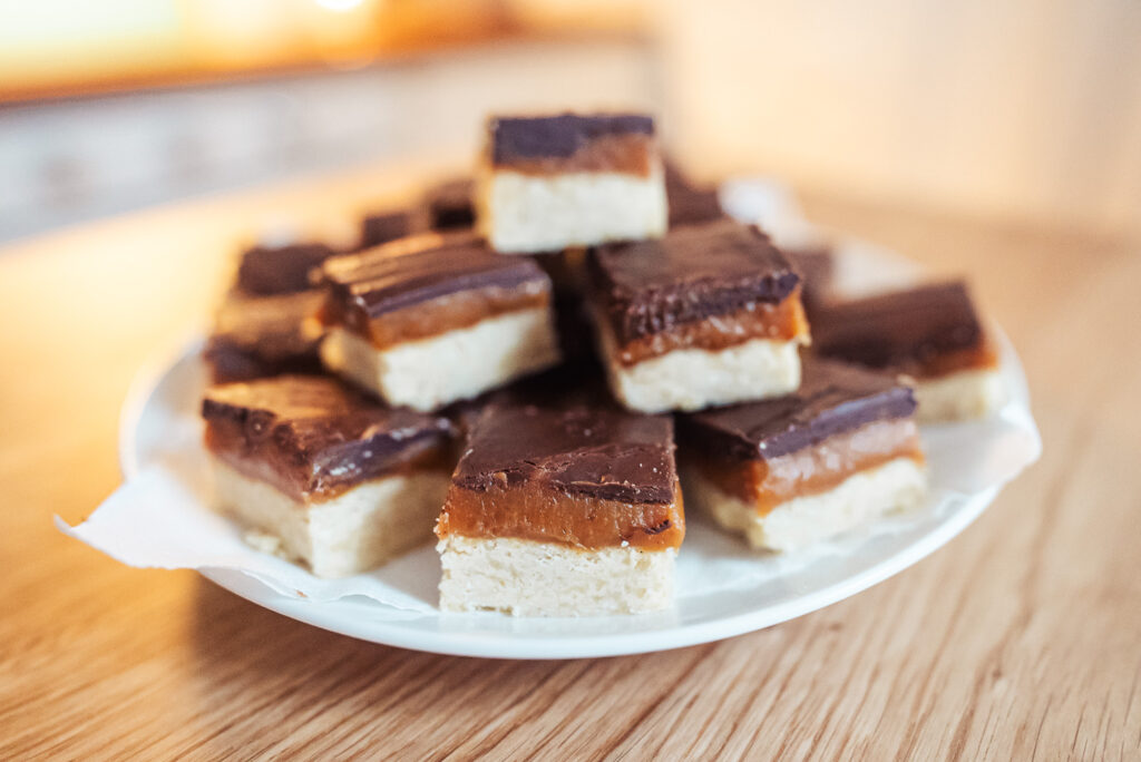 Norwegian brown cheese caramel squares on a plate