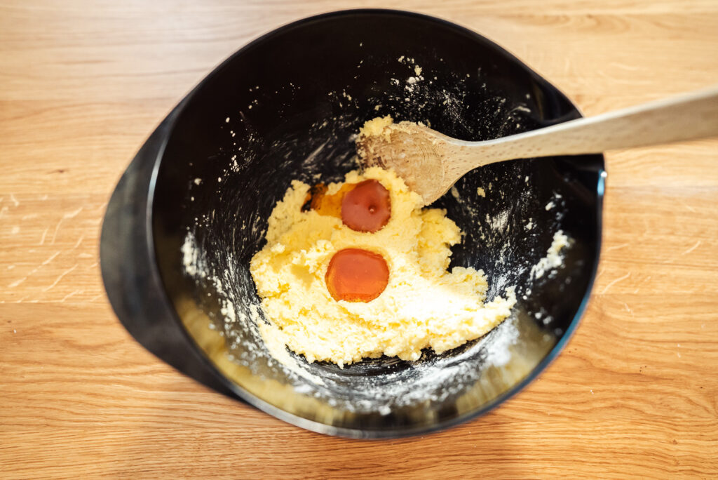 adding syrup to cookie dough