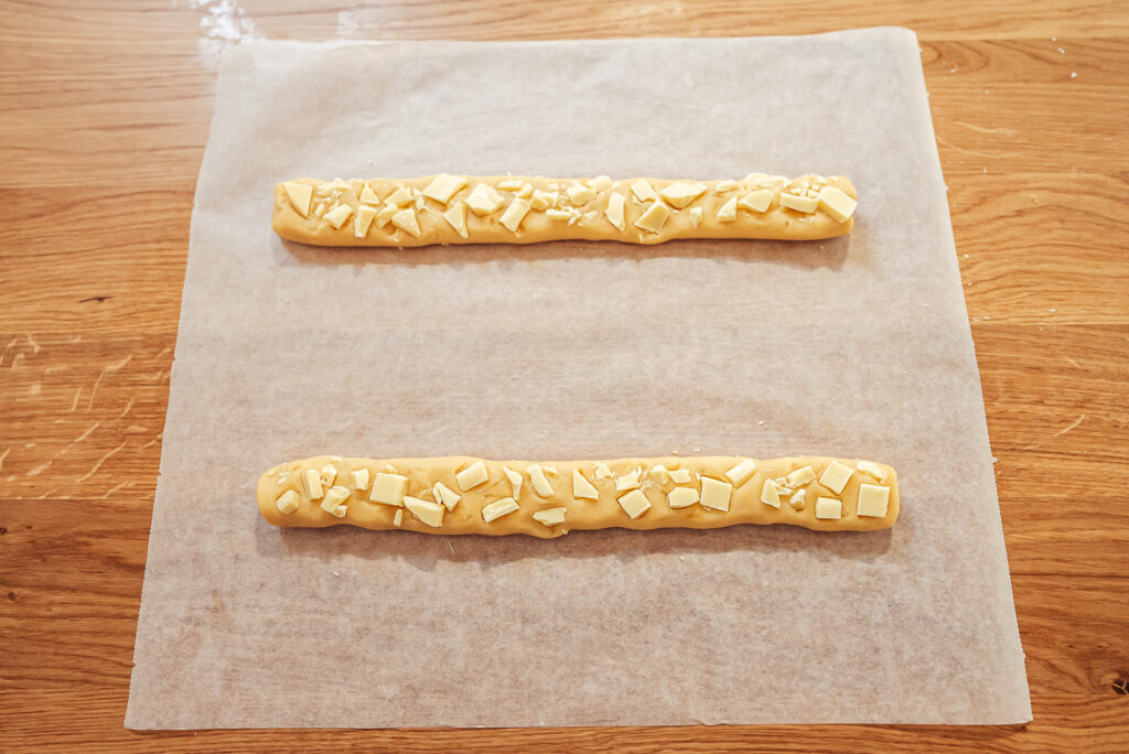 rolling out citronsnittar cookie dough to make Swedish lemon slice cookies