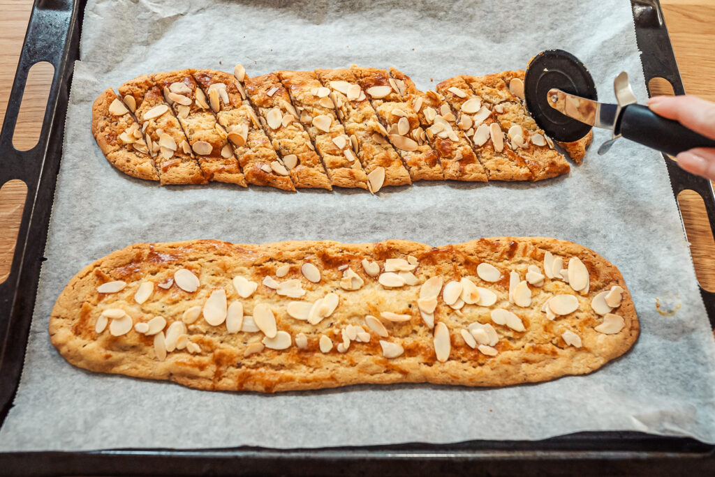 slicing Swedish almond cookies