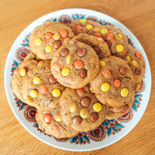 Norwegian brown cheese Reese's pieces cookies on a plate
