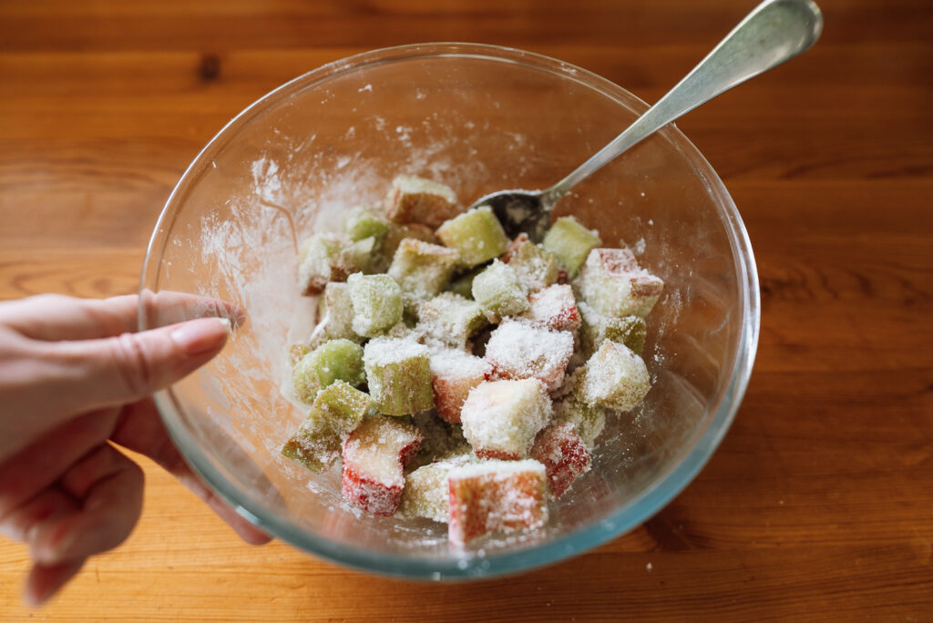 chopped rhubarb with sugar in a bowl